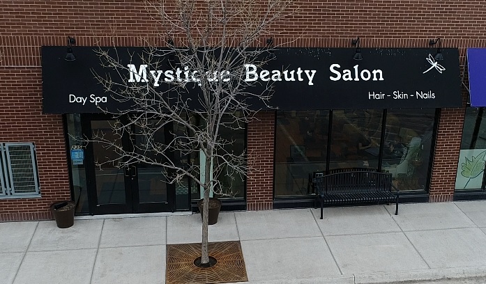 Mystique Beauty Salon logo