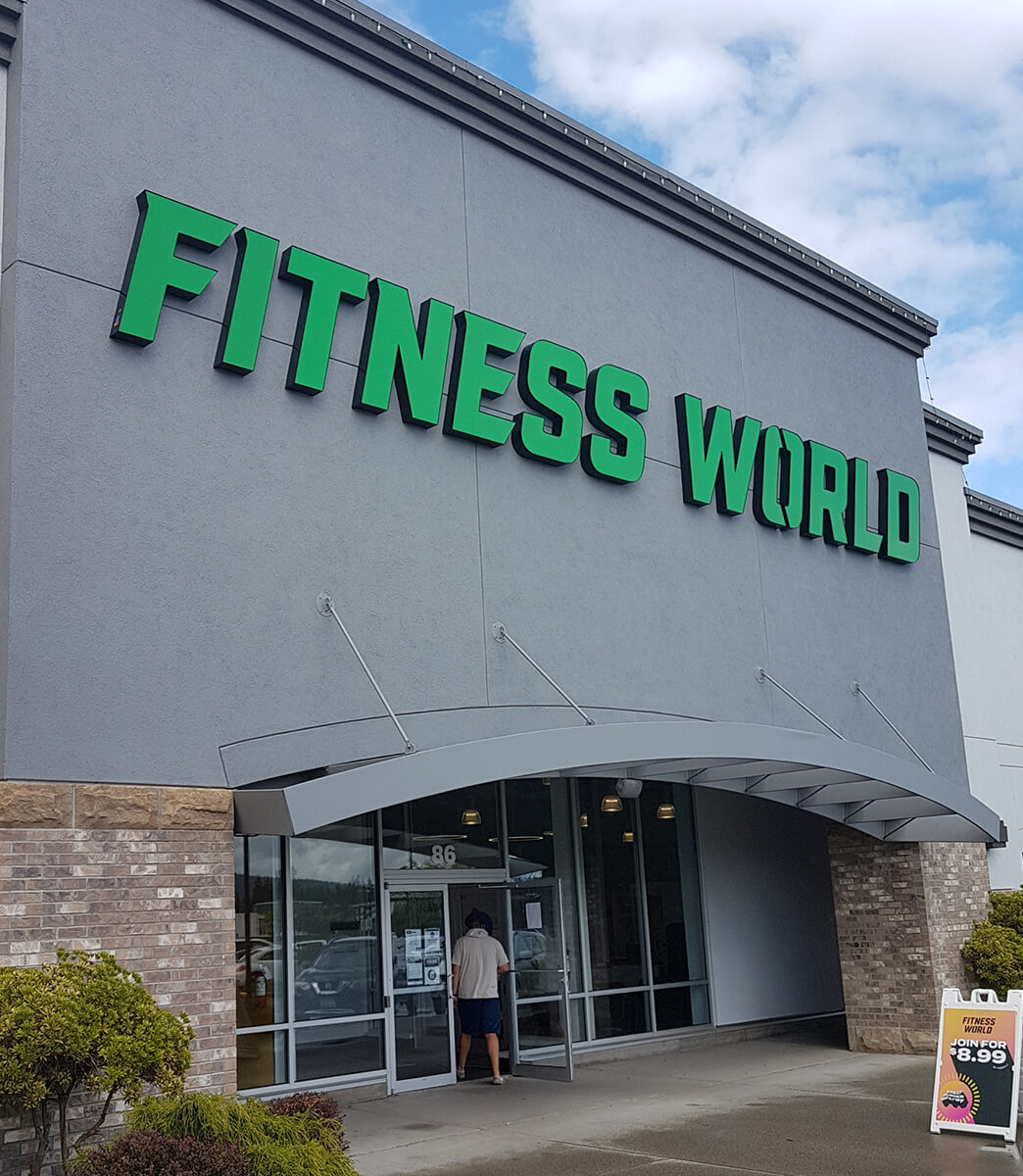 The Fitness World GYM logo