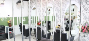 Star Delux Unisex Hair Saloon logo