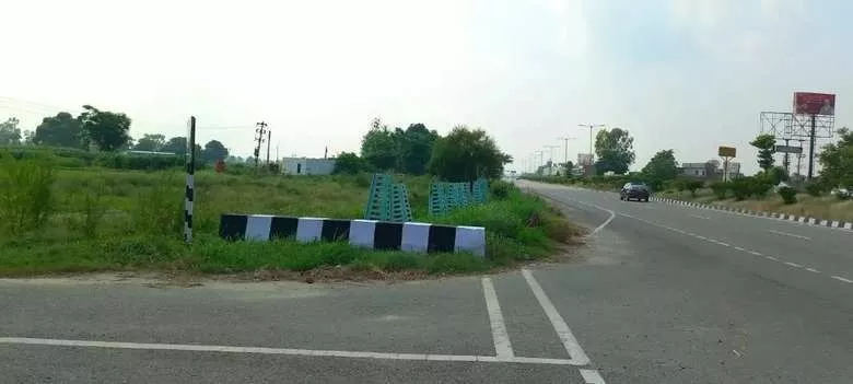 "Prime 2.5 Acre Agricultural Land for Sale on National Highway"