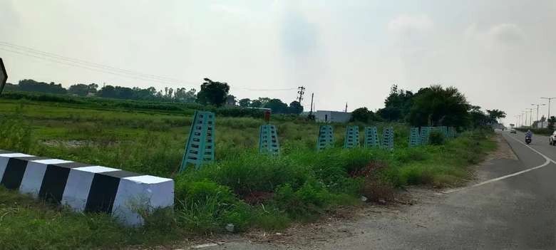 "Prime 2.5 Acre Agricultural Land for Sale on National Highway"