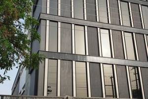 Modern Factory Building for M/s Interior Crafts: Innovative Design with Central Courtyard and Aluminum Fa - Professional Services in Noida
