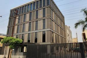 Modern Factory Building for M/s Interior Crafts: Innovative Design with Central Courtyard and Aluminum Fa - Professional Services in Noida